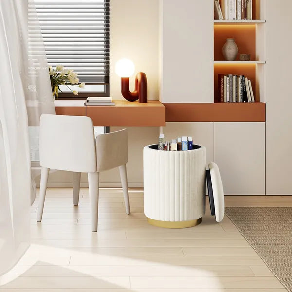 Off-white upholstered storage vanity ottoman with gold metal base