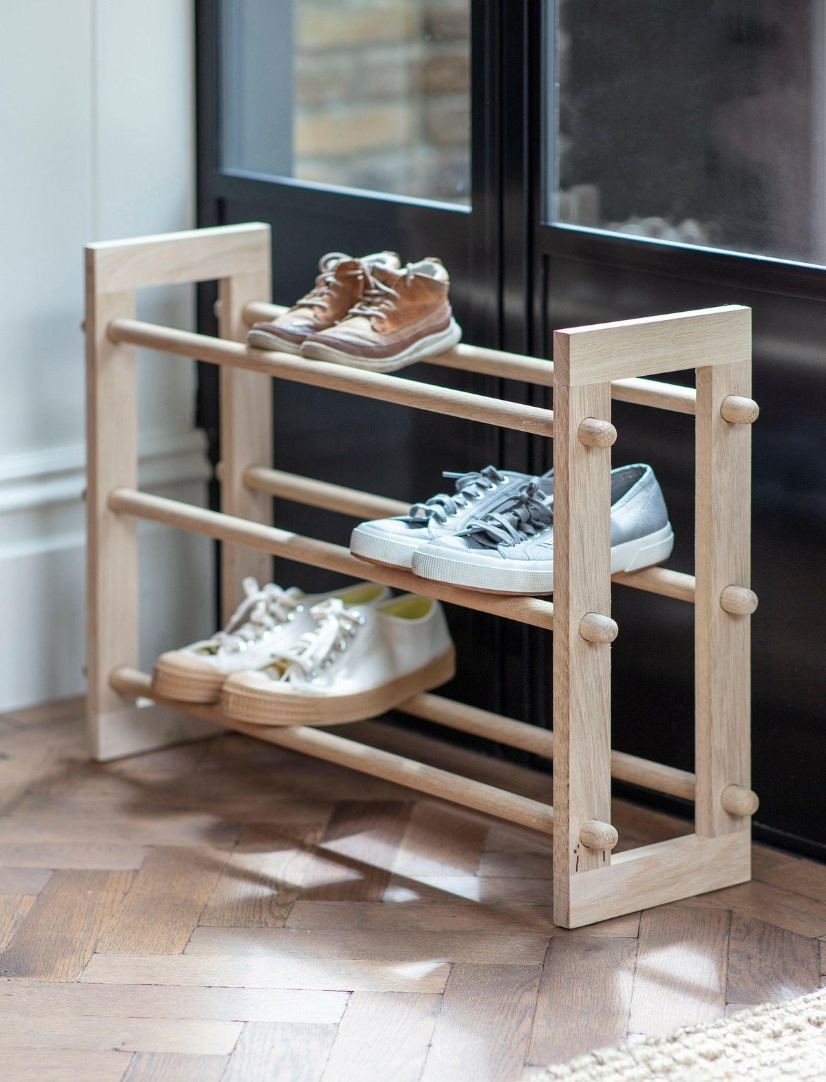 Low hallway shoe rack with raw oak shelves