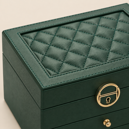 green macro of large green jewelry organizer with drawers lock on beige; styling accessories not included