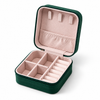 mini white of green mini travel jewelry case on white