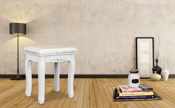 White wood vanity stool with cushioned beige seat